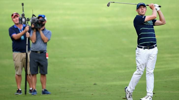 Golfer Oliver Wilson birdies the 18th in round three